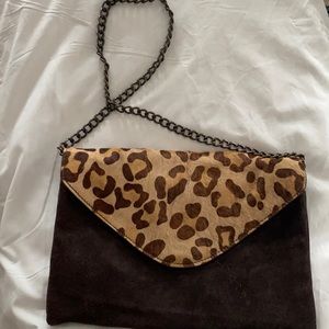 Suede and calf hair clutch